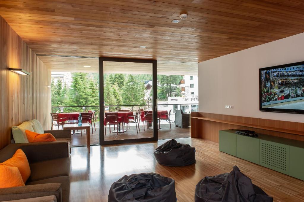 Area soggiorno di Bed & Breakfast Hostel Nives