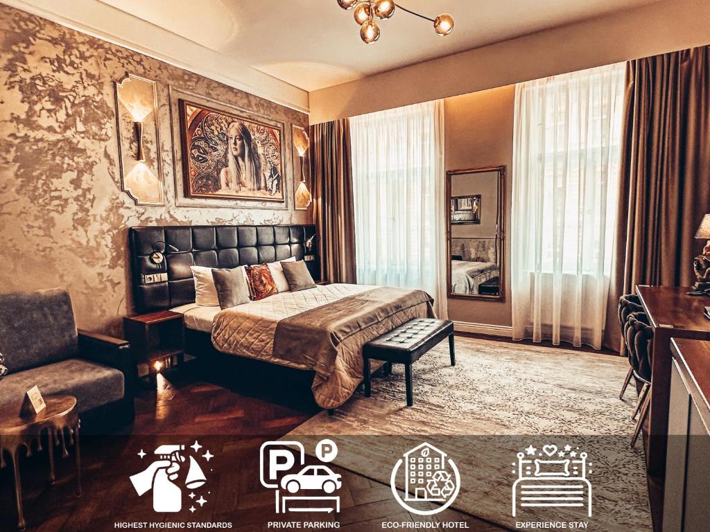 Postel nebo postele na pokoji v ubytování Alfons Boutique Hotel