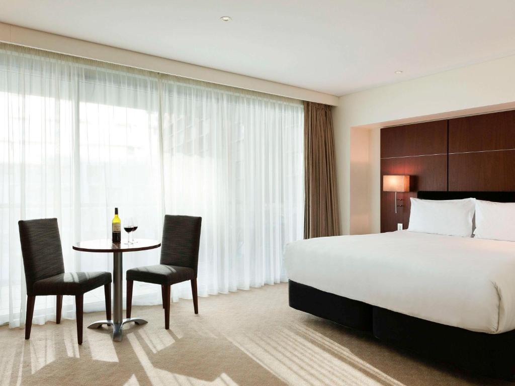 Un ou plusieurs lits dans un hébergement de l'établissement Pullman Auckland Hotel & Apartments