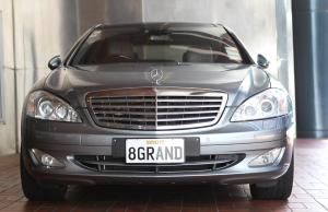 a silver car is parked in a garage at The Grand by SkyCity in Auckland