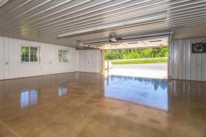 a large empty room with a swimming pool at Modern Deadwood Apt with Mountain Views and Grill! in Deadwood