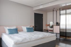 Ένα ή περισσότερα κρεβάτια σε δωμάτιο στο Break Sokos Hotel Flamingo