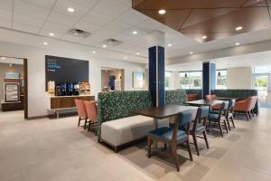 A seating area at Holiday Inn Express Cape Canaveral by IHG
