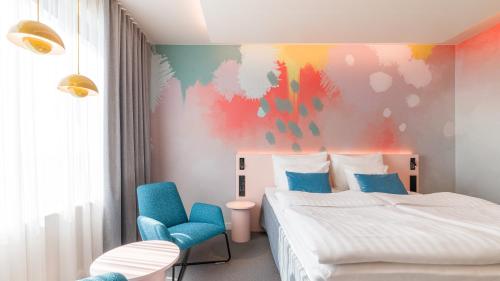 Ένα ή περισσότερα κρεβάτια σε δωμάτιο στο Break Sokos Hotel Flamingo
