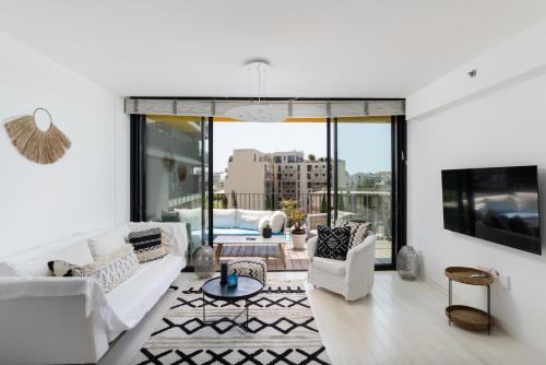 Bright & Chic Condo with Pool & Unique View by FeelHome