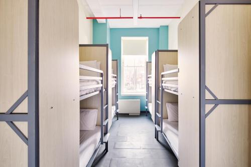 a row of bunk beds in a dorm room at HI New York City Hostel in New York
