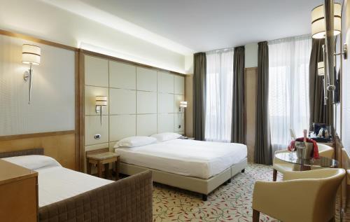 Postel nebo postele na pokoji v ubytování Hotel Teco
